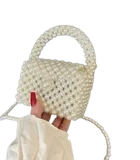 Photo of شنطة نسائية صنع يدوي صغيرة